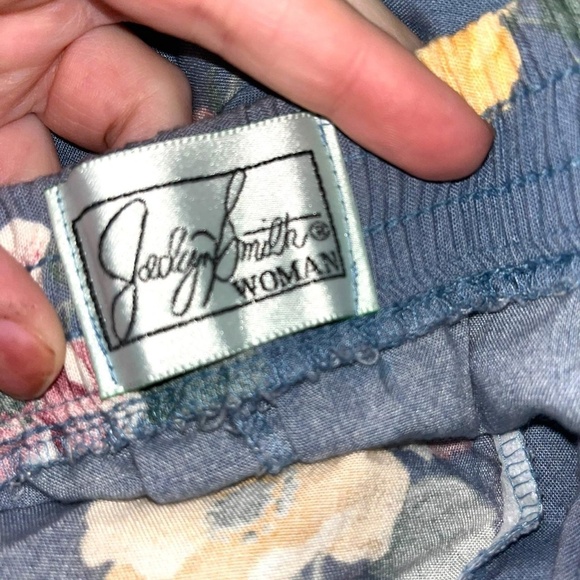 Blue floral midi skirt with button front   Measurements: Waist 40-46 in. - Picture 3 of 4